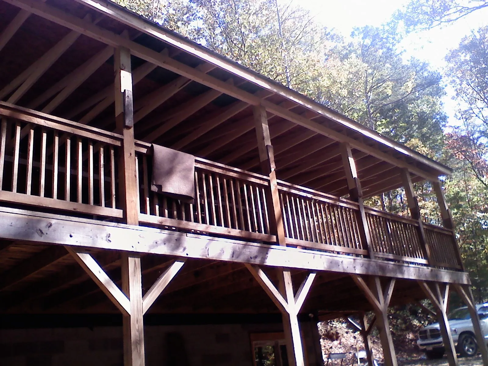 Timber framing under a new elevated porch and deck — Roof Leak Repair in Erath by Roofing Brothers